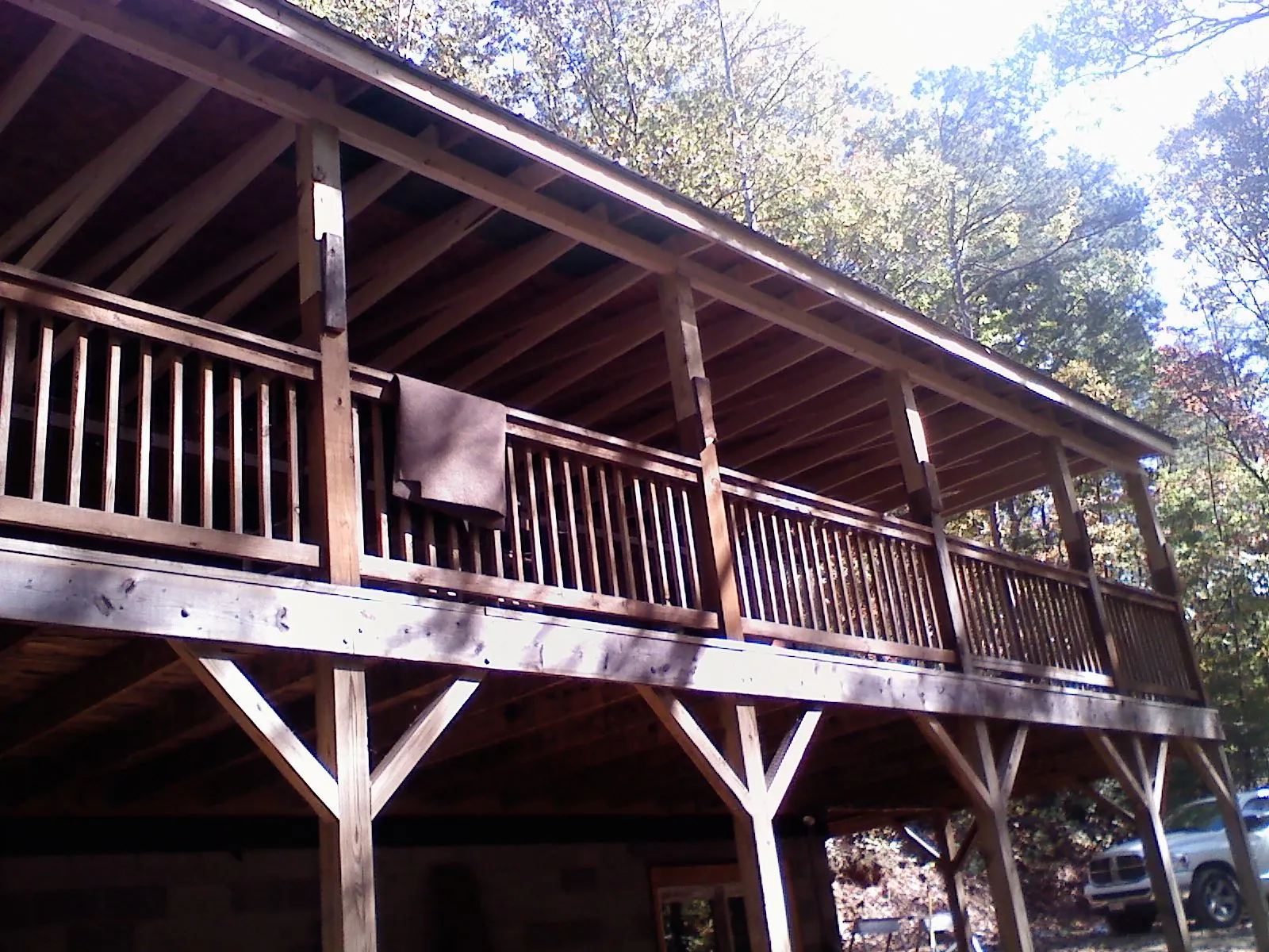 Timber framing under a new elevated porch and deck — Roof Leak Repair in Plymouth by Roofing Brothers